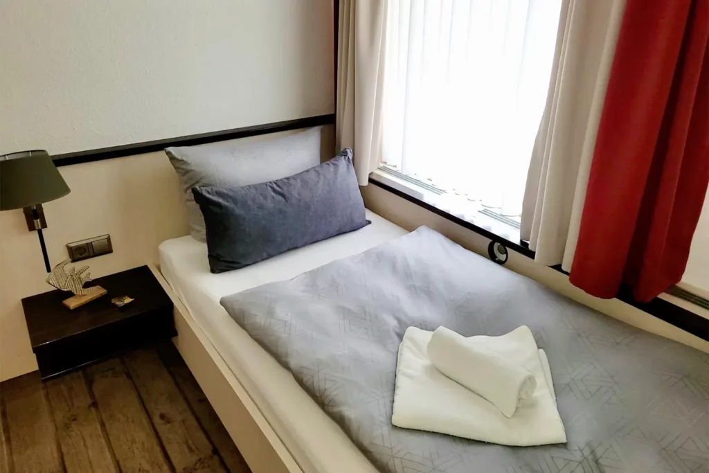 Einzelbett im Hotelappartement